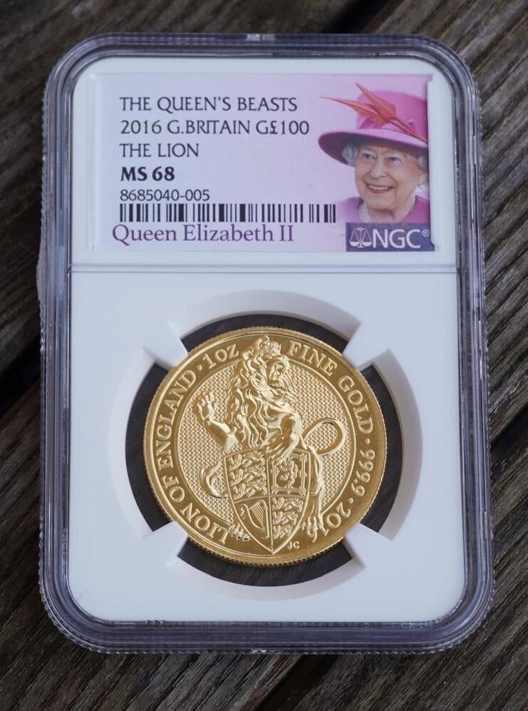 NGC-graded 2016 British gold coin featuring the Lion from Queens Beasts series, MS 68 rating, with Queen Elizabeth II portrait on label